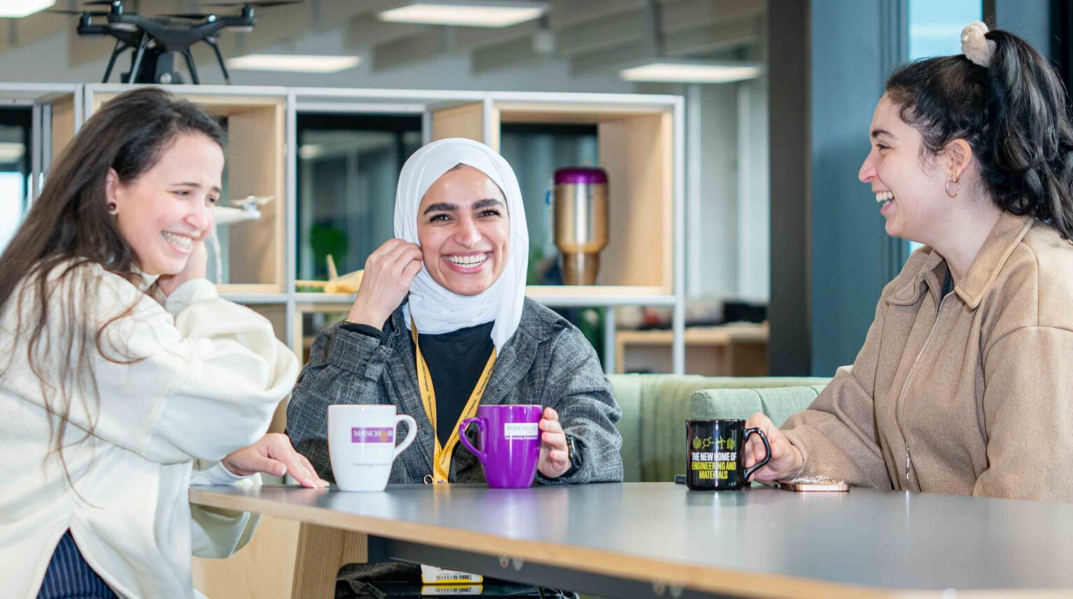 The image highlights collaboration and the social side of working in science