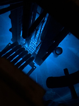 Cherenkov radiation from reactor operation.