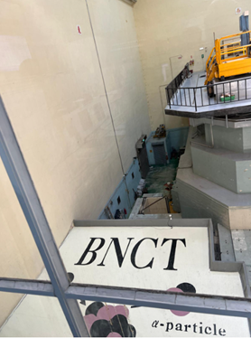 A sign indicates an informational display of Boron Neutron Capture Therapy