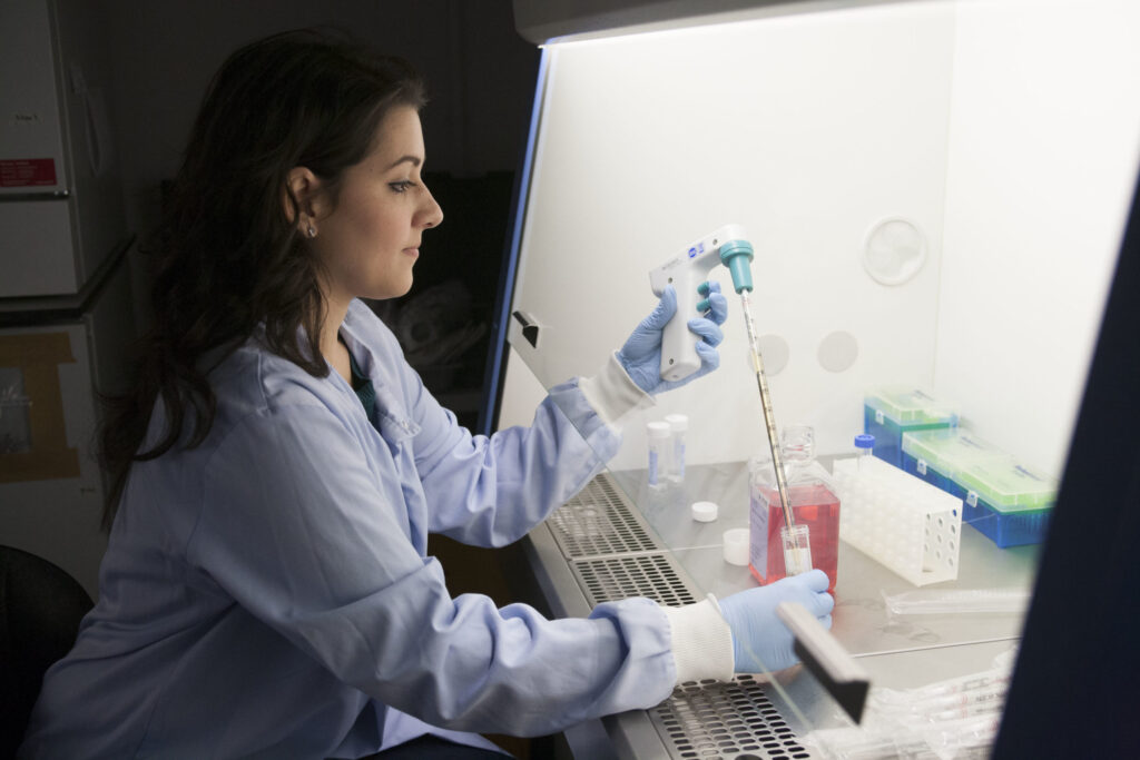 Woman scientist looking at samples