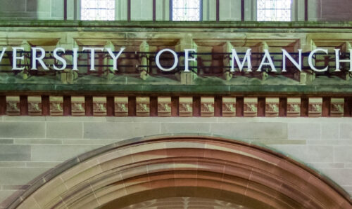 Building with "University of Manchester" sign