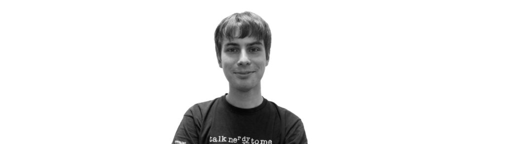 Black and white photograph of smiling man