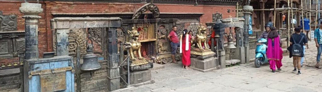 The frontage of a brick temple in Nepal