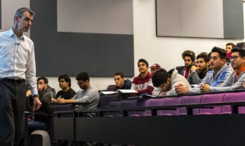 Students and lecturer in a lecture theatre