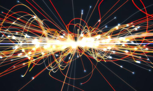 Representation of a microscopic nuclear reaction with colourful lines emanating from a bright centre
