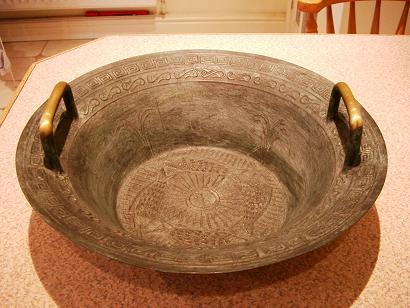 a) Replica bronze washbowl
